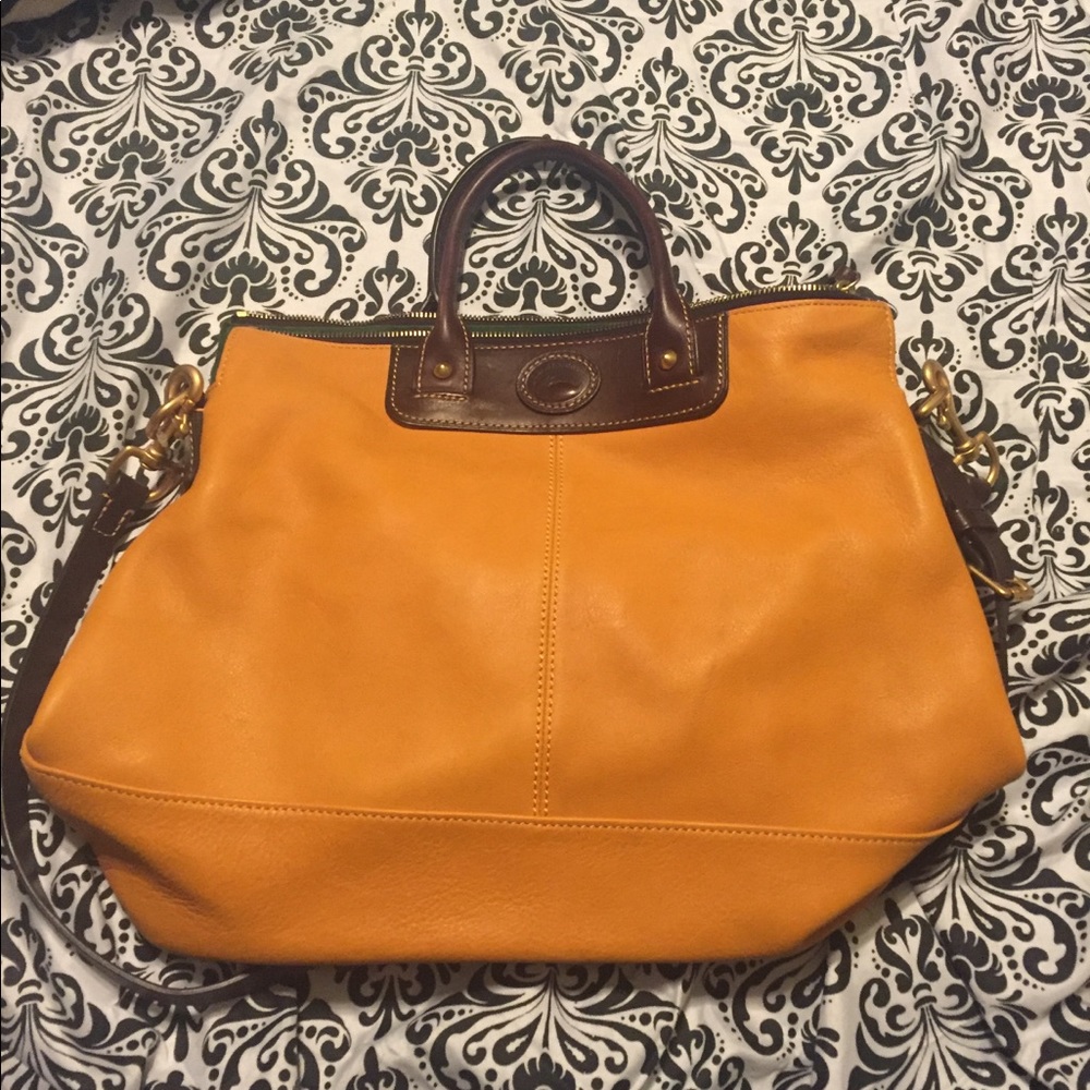 Mustard shoulder used dooney and Burke purse